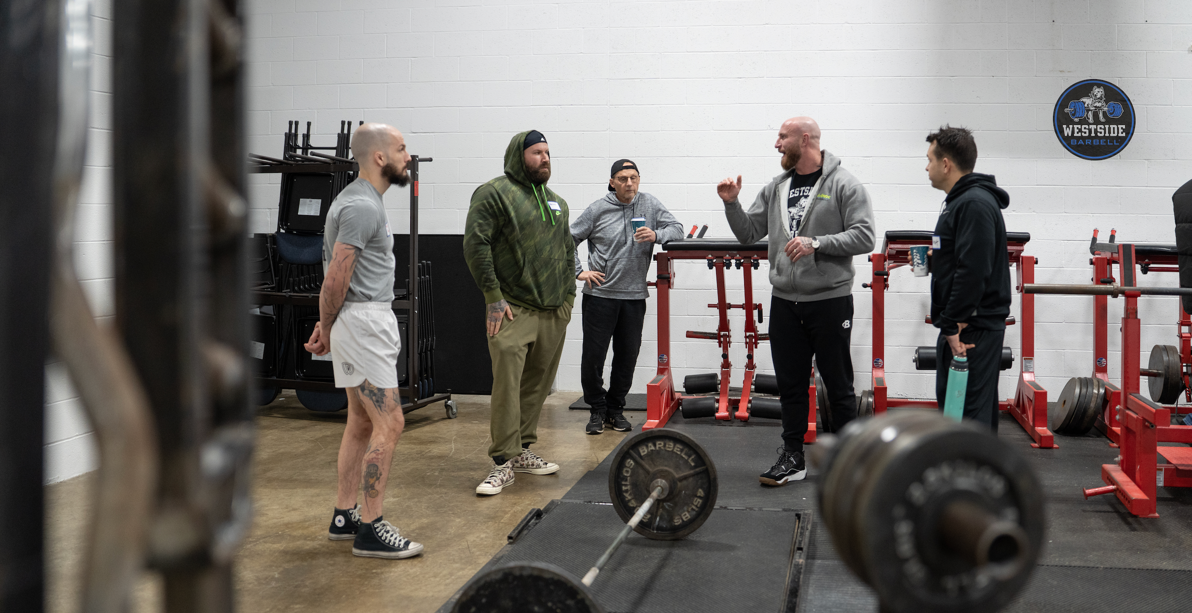 Craig Bongelli running a seminar at Westside Barbell